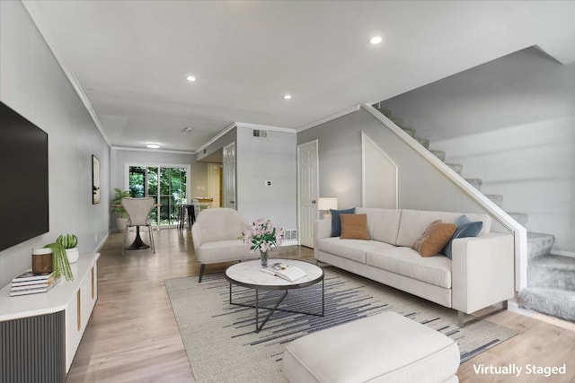 1912 Lightsey Rd Unit 1, Austin, TX 78704 - living room featuring ornamental molding, light wood-type flooring, recessed lighting, and stairway