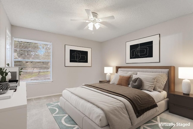 1912 Lightsey Rd Unit 1, Austin, TX 78704 - bedroom featuring light colored carpet, a textured ceiling, baseboards, and ceiling fan