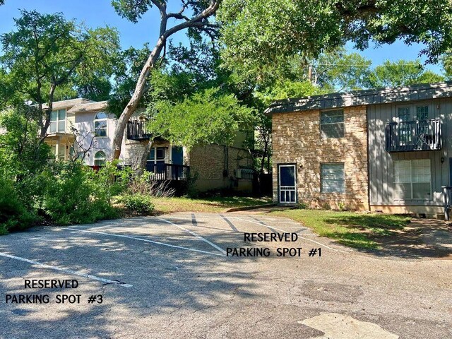 1912 Lightsey Rd Unit 1, Austin, TX 78704 - view of building exterior with uncovered parking
