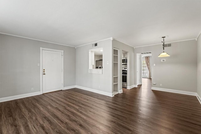 7920 Rockwood Ln Unit 104, Austin, TX 78757 - unfurnished living room with dark wood-style floors, baseboards, ornamental molding, and built in shelves