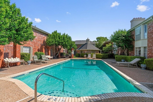 7920 Rockwood Ln Unit 104, Austin, TX 78757 - community pool featuring a patio