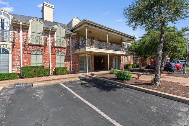 7920 Rockwood Ln Unit 104, Austin, TX 78757 - view of building exterior featuring uncovered parking