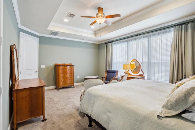 419 Davis Mountain Cir, Georgetown, TX 78633 - bedroom featuring light carpet, ornamental molding, a tray ceiling, recessed lighting, and baseboards