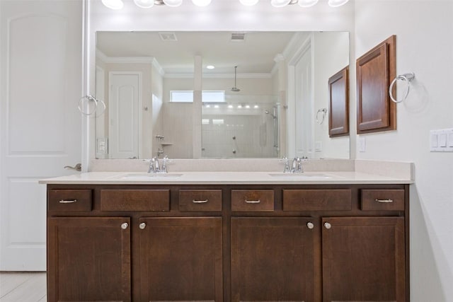 419 Davis Mountain Cir, Georgetown, TX 78633 - full bathroom featuring a stall shower, double vanity, and ornamental molding