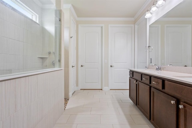 419 Davis Mountain Cir, Georgetown, TX 78633 - full bathroom featuring a walk in shower, double vanity, and crown molding
