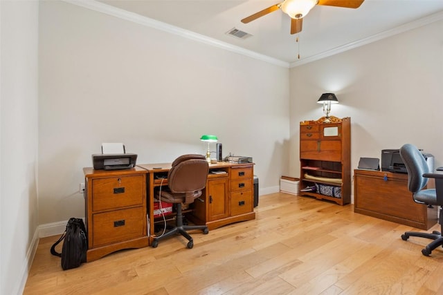 419 Davis Mountain Cir, Georgetown, TX 78633 - office area featuring ornamental molding, light wood-style flooring, ceiling fan, and baseboards