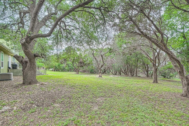 100 Comanche Trl, Georgetown, TX 78633 - view of green lawn featuring central air condition unit