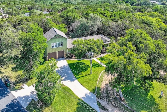 100 Comanche Trl, Georgetown, TX 78633 - view of subject property featuring a heavily wooded area