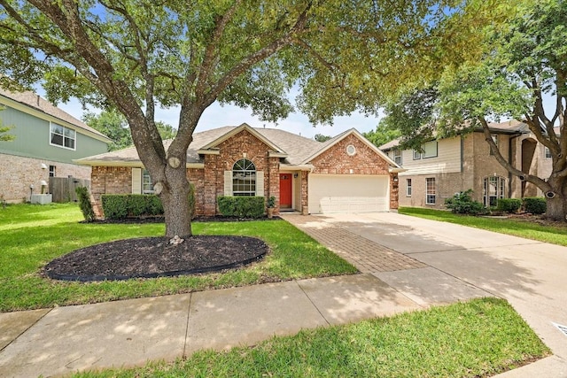 2713 Oakwood Glen Dr, Cedar Park, TX 78613 - traditional home featuring a garage, concrete driveway, a front lawn, and brick siding