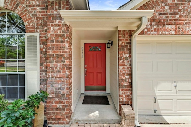 2713 Oakwood Glen Dr, Cedar Park, TX 78613 - entrance to property featuring brick siding and a garage