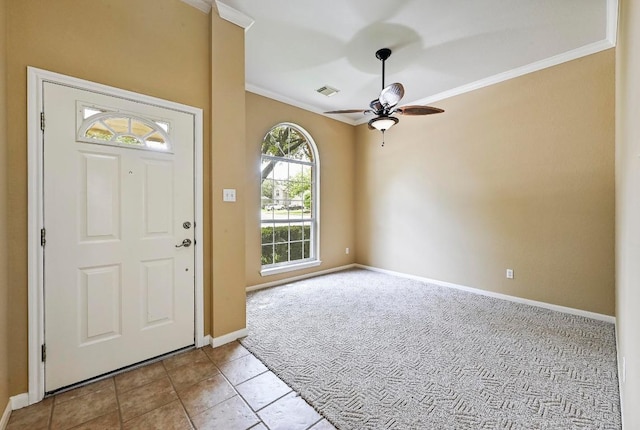 2713 Oakwood Glen Dr, Cedar Park, TX 78613 - carpeted entryway with ornamental molding, baseboards, and a ceiling fan