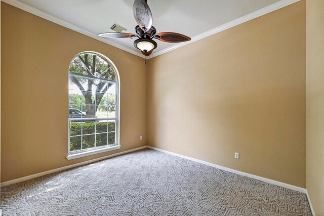 2713 Oakwood Glen Dr, Cedar Park, TX 78613 - carpeted spare room featuring ornamental molding, a ceiling fan, healthy amount of natural light, and baseboards