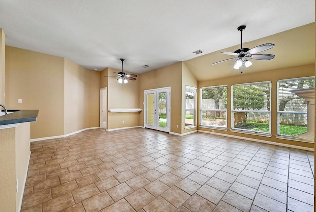 2713 Oakwood Glen Dr, Cedar Park, TX 78613 - unfurnished living room featuring ceiling fan, vaulted ceiling, and baseboards