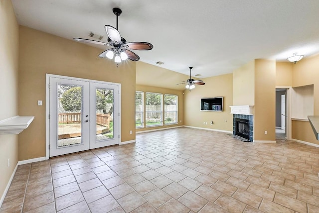 2713 Oakwood Glen Dr, Cedar Park, TX 78613 - unfurnished living room featuring ceiling fan, lofted ceiling, french doors, a tiled fireplace, and baseboards