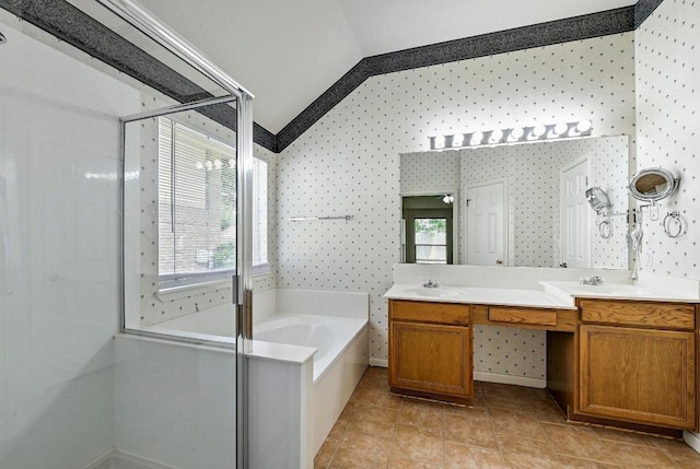 2713 Oakwood Glen Dr, Cedar Park, TX 78613 - full bath with lofted ceiling, a bath, a shower stall, double vanity, and wallpapered walls