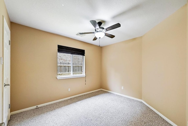 2713 Oakwood Glen Dr, Cedar Park, TX 78613 - unfurnished room with carpet, ceiling fan, and baseboards