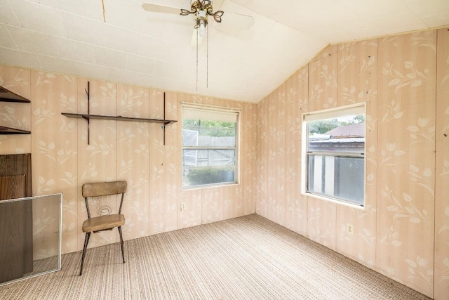 104 N Fair St, Gonzales, TX 78629 - unfurnished room with carpet floors, vaulted ceiling, and ceiling fan