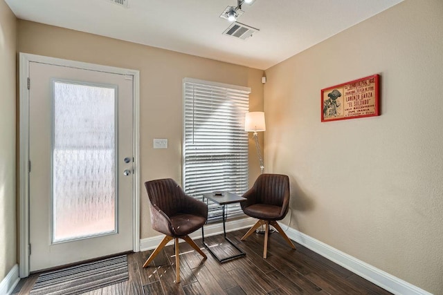 6900 E Riverside Dr Unit 6, Austin, TX 78741 - sitting room with dark wood finished floors