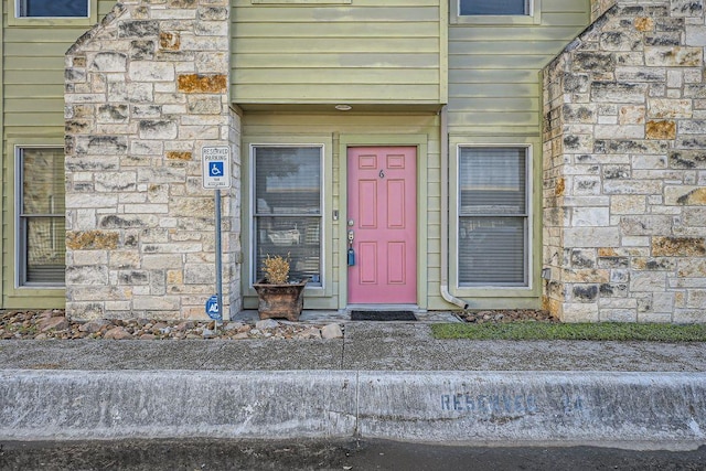 6900 E Riverside Dr Unit 6, Austin, TX 78741 - view of exterior entry featuring stone siding