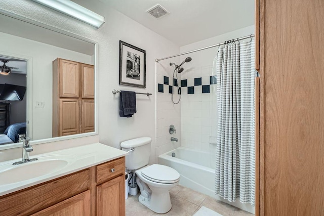 6900 E Riverside Dr Unit 6, Austin, TX 78741 - ensuite bathroom featuring shower / tub combo, vanity, and tile patterned flooring