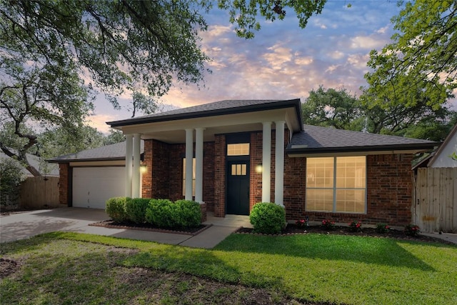 1202 Deergrove Dr, Cedar Park, TX 78613 - view of front of house featuring concrete driveway, brick siding, an attached garage, and roof with shingles