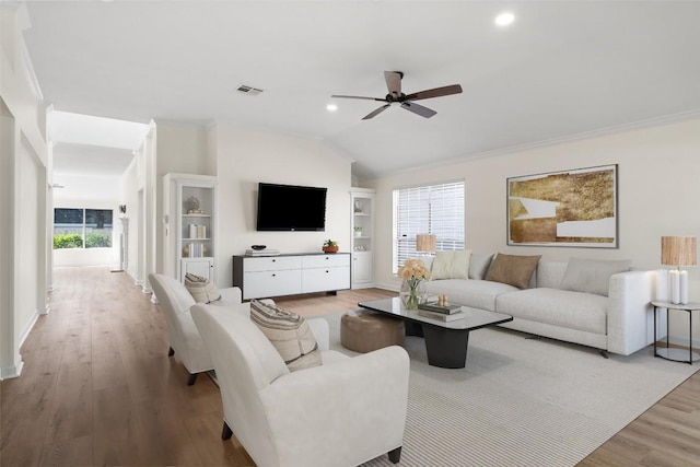 1202 Deergrove Dr, Cedar Park, TX 78613 - living area featuring wood finished floors, a ceiling fan, baseboards, lofted ceiling, and recessed lighting