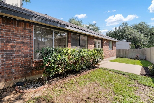 1202 Deergrove Dr, Cedar Park, TX 78613 - view of property exterior featuring brick siding and a patio
