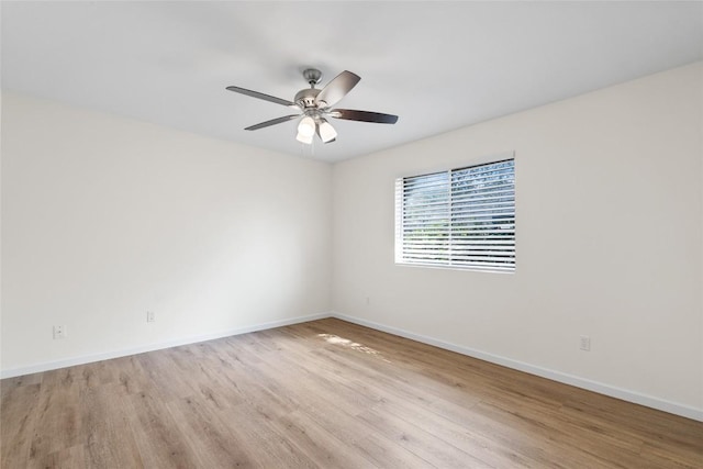 1202 Deergrove Dr, Cedar Park, TX 78613 - spare room featuring wood finished floors, baseboards, and ceiling fan