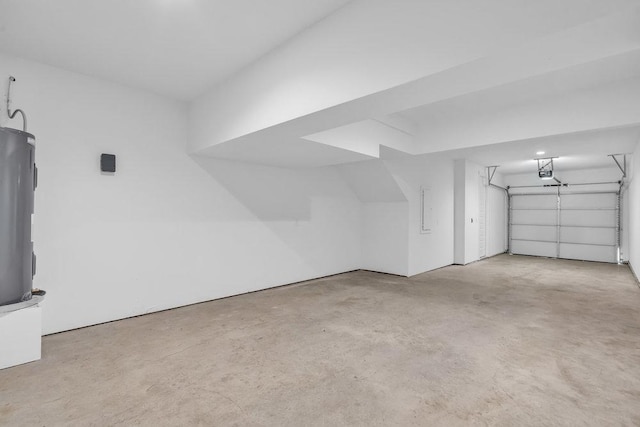 additional living space featuring concrete floors