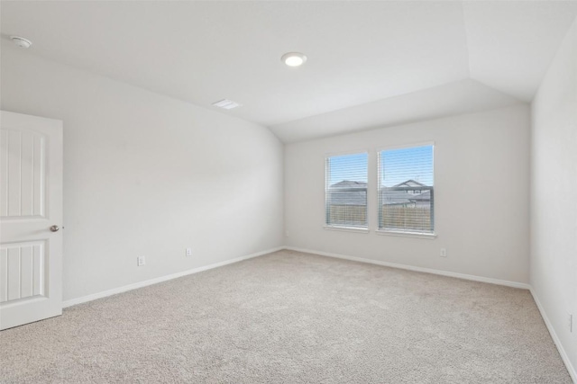 528 Evergreen Sumac Loop, Kyle, TX 78640 - carpeted spare room with a smoke detector, baseboards, and vaulted ceiling