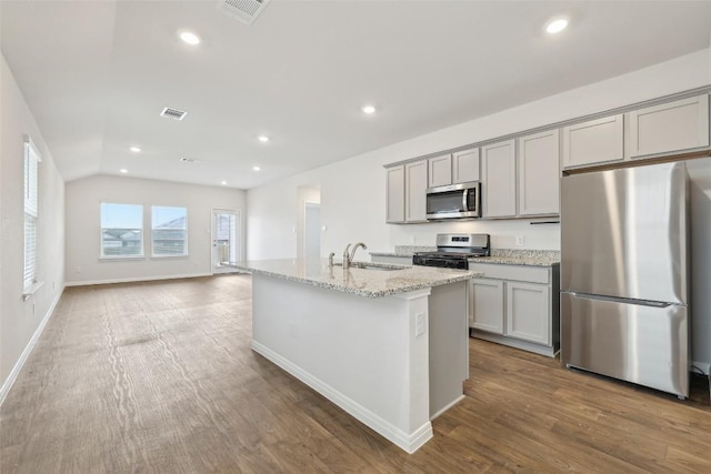 528 Evergreen Sumac Loop, Kyle, TX 78640 - kitchen featuring stainless steel appliances, gray cabinetry, a sink, wood finished floors, and recessed lighting