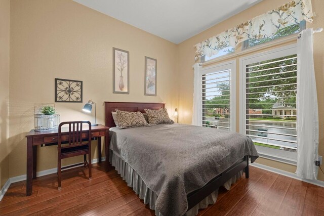 18004 Rosebud Pl, Round Rock, TX 78681 - bedroom featuring wood finished floors and baseboards