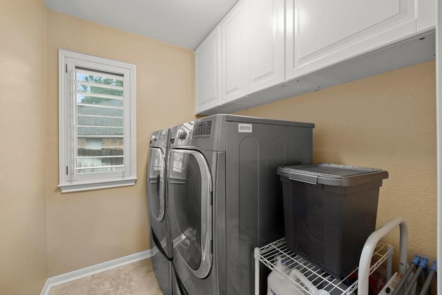 18004 Rosebud Pl, Round Rock, TX 78681 - laundry area with washer and clothes dryer, cabinet space, and baseboards
