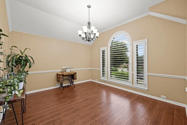 18004 Rosebud Pl, Round Rock, TX 78681 - spare room with a chandelier, vaulted ceiling, wood finished floors, ornamental molding, and baseboards