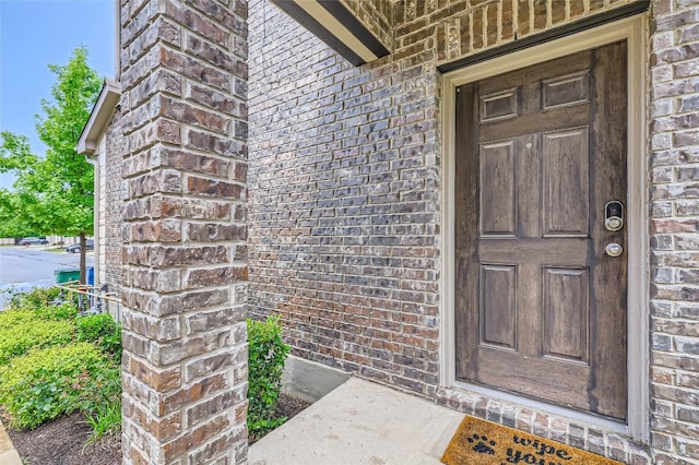 17301 Leafroller Dr Unit A, Pflugerville, TX 78660 - doorway to property featuring brick siding