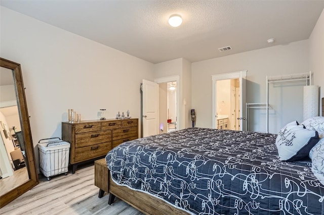 17301 Leafroller Dr Unit A, Pflugerville, TX 78660 - bedroom with wood finished floors
