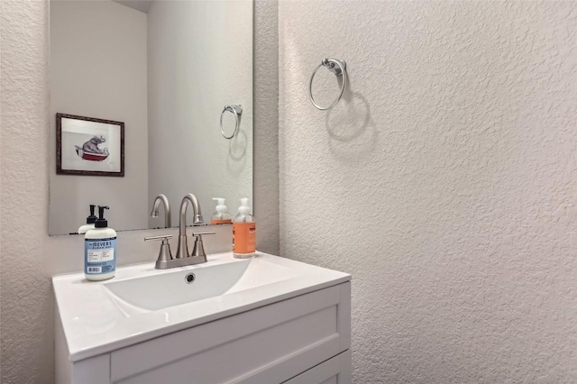 17301 Leafroller Dr Unit A, Pflugerville, TX 78660 - bathroom with a textured wall and vanity