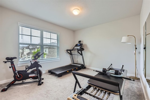 17301 Leafroller Dr Unit A, Pflugerville, TX 78660 - exercise area featuring baseboards and carpet