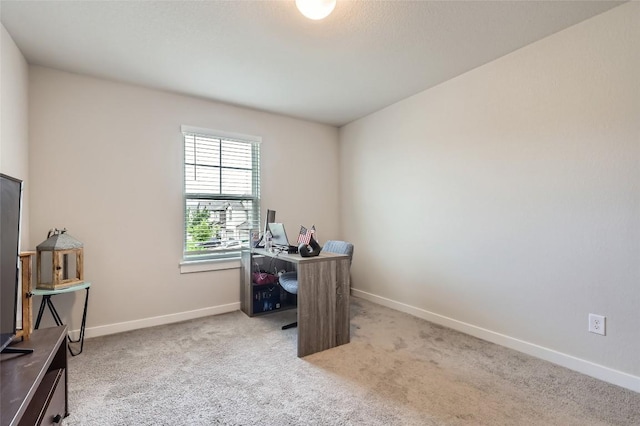 17301 Leafroller Dr Unit A, Pflugerville, TX 78660 - office area featuring baseboards and carpet flooring