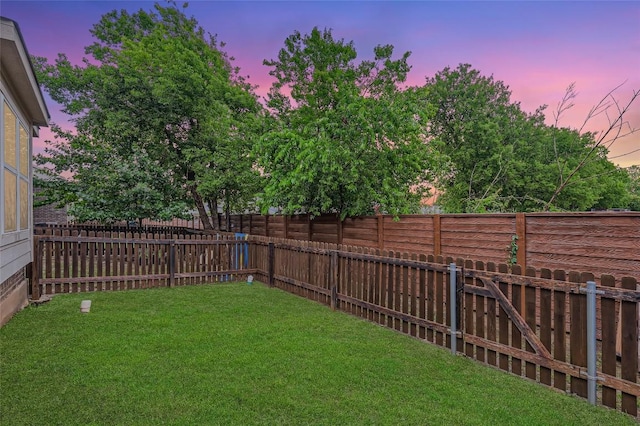 17301 Leafroller Dr Unit A, Pflugerville, TX 78660 - view of yard at dusk