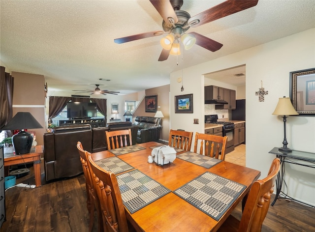 1810 Summer Rain Dr, Cedar Park, TX 78613 - dining room featuring a ceiling fan, light wood finished floors, and a textured ceiling