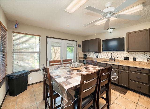 1810 Summer Rain Dr, Cedar Park, TX 78613 - dining room featuring light tile patterned floors, a ceiling fan, and french doors