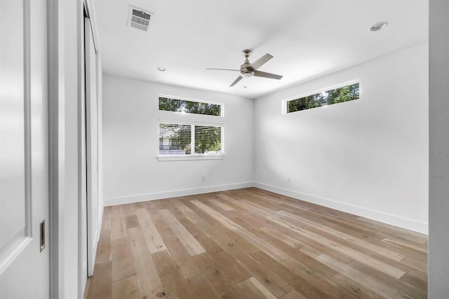 1314 Delano St Unit A, Austin, TX 78721 - empty room featuring plenty of natural light, a ceiling fan, light wood-style flooring, baseboards, and recessed lighting