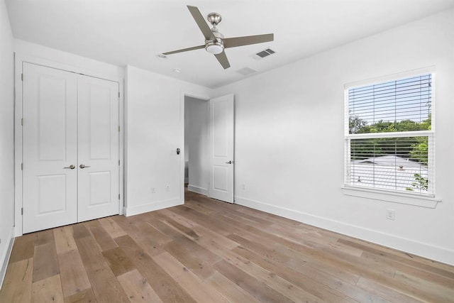 1314 Delano St Unit A, Austin, TX 78721 - unfurnished bedroom featuring baseboards and light wood-style flooring