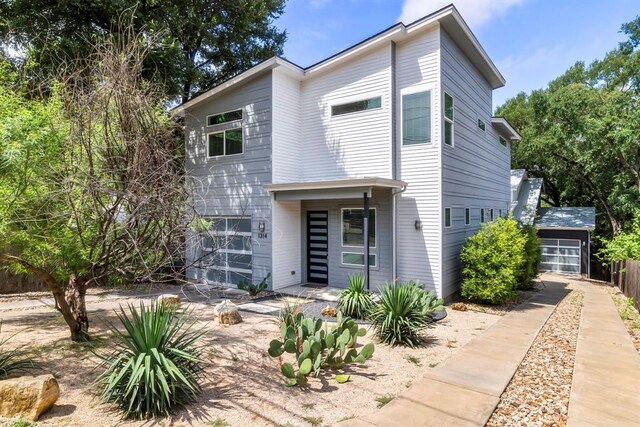 1314 Delano St Unit A, Austin, TX 78721 - contemporary house featuring fence and driveway