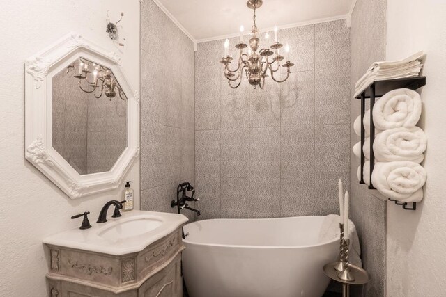 326 Zapalac Rd, Smithville, TX 78957 - full bath with a sink, a chandelier, a freestanding tub, and ornamental molding