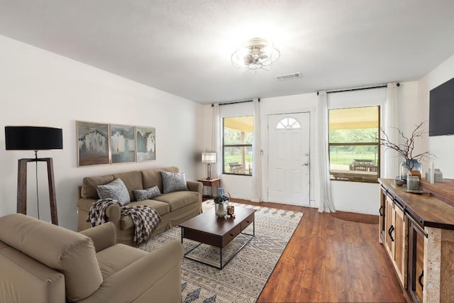 326 Zapalac Rd, Smithville, TX 78957 - living area featuring wood finished floors, baseboards, and beverage cooler