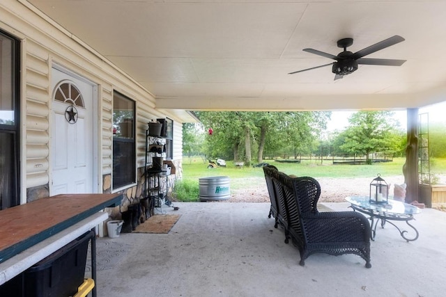 326 Zapalac Rd, Smithville, TX 78957 - view of patio featuring ceiling fan