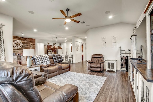 living area with ceiling fan, recessed lighting, dark wood-style flooring, and baseboards