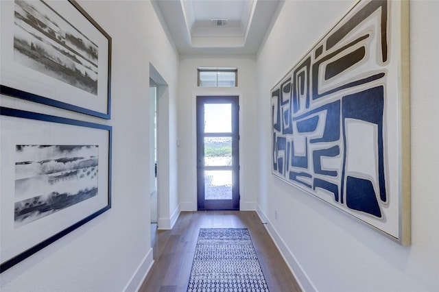 105 Isaac White Dr, Bastrop, TX 78602 - doorway with dark wood-style floors and baseboards